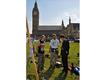 With the Houses of Parliament in the background, Rory chats to a couple of people at the makeshift 'Democracy Village' in Parliament Square, and looks at the newly planted 'peace garden' with them.