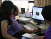 Residents looking at Facebook