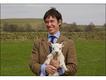 Admiring a farmer's new lamb. Photo: Margaret Langdon Hamilton