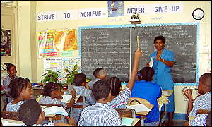 Teacher in classroom in Jamaica 