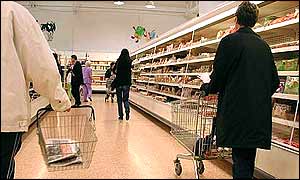 Shoppers inside an Asda store