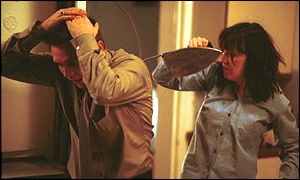 Kacey Ainsworth as Little Mo, attacking Trevor