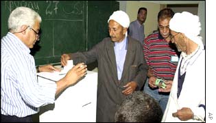 An Algerian man casts his vote