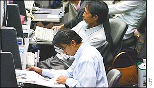 Traders at Jakarta stock exchange