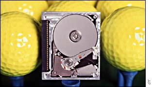 An IBM hard drive the same size as a golf ball