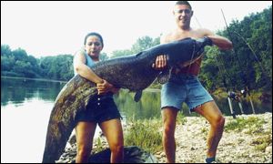 Mrs and Mrs Broadbent with catfish