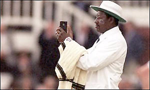 Bucknor consults his light-meter