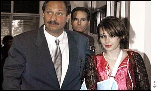 Winona Ryder is escorted out of court 