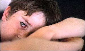 boy folding arms