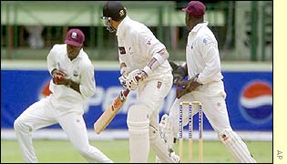 Chris Gayle catches Daryl Tuffey off Carl Hooper