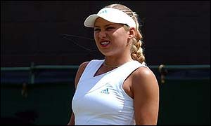 Anna Kournikova looks disconsolate during her first round match at Wimbledon 2002