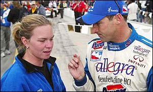 Sarah Fisher and Robbie Buhl confer during this year's Indy 500 qualifying.