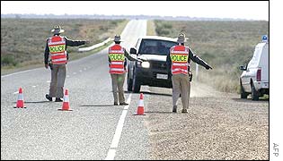 Australian police search vehicles