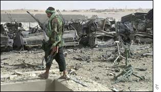 Soldier surveying the destruction 