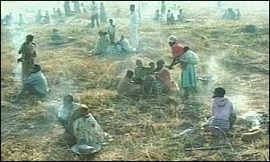 People in empty field