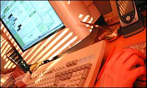 Surfer at computer