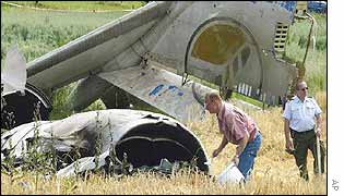 Recovery crews comb the wreckage
