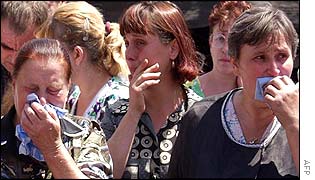 Miners' relatives wait for news