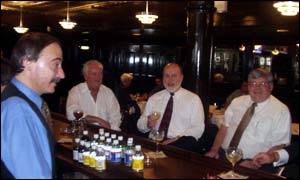 Customers at Harry's Bar consider the impact of President Bush's speech