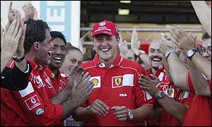 Michael Schumacher celebrates his F1 title with the Ferrari team