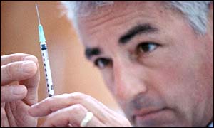 Doctor with syringe