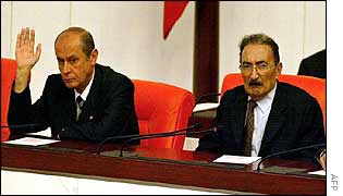 Opposition grouping leader Devlet Bahceli (left), with Prime Minister Bulent Ecevit  in parliament 