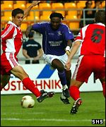 Eugene Dadi tries to find a way through