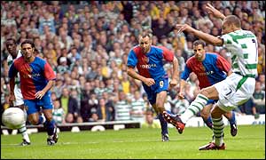 Celtic's Henrik Larsson scores a penalty to equalise for the Scottish giants just before half-time  