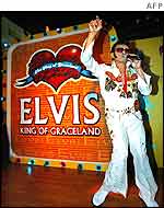 Elvis impersonator Marciano Franco takes part in an Elvis impersonation contest in Malaysia  