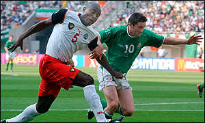 Raymond Kalla marks Ireland's Robbie Keane at the 2002 World Cup  