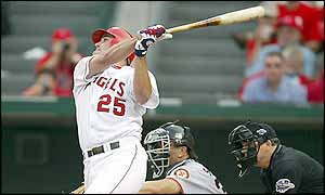 Troy Glaus  hits two homers in the second and sixth innings 