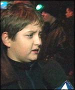 Boy outside theatre