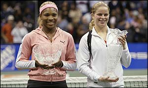 Williams and Clijsters pose after being presented with trophies after the final in Los Angeles