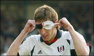 Sava puts on a  eye-mask after scoring for Fulham 