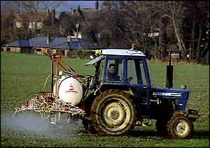 Tractor spraying field    BBC