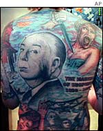 Tattooed man, AP
