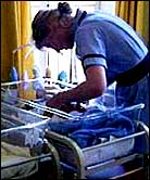 Midwife and baby