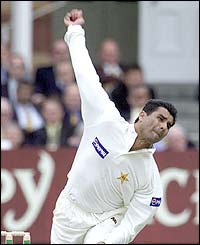 Dennis Lillee and Waqar share the record for 200 Test wickets in the least number of Tests.  