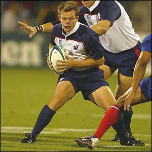 Mike Hercus of the USA makes a dash for the try-line