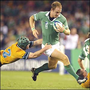Ireland wing Dennis Hickie sprints towards the Australian try-line