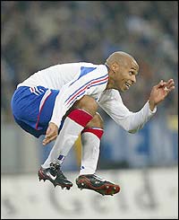 France's Thierry Henry ducks after heading the ball during his side's 1-0 friendly win over Germany
