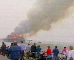 People watch pier fire