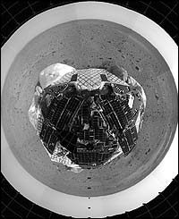 The pictures show the barren, rock-strewn landscape surrounding the Spirit lander.