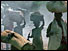 Rwandan refugees on a dusty road