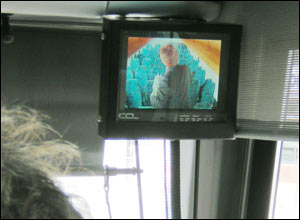 CCTV  pictures on a screen above the steering wheel