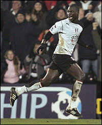 Diop celebrates scoring the equaliser for Fulham