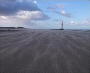 A windy day at Talacre Beach near the lighthouse, sent by Bryony Taylor from Dyserth in north Wales.