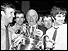 Holding cup from L-R Pat Crerand, Matt Busby, George Best 