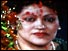 photo of murdered Queen of Nepal with garlands