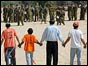 Settlers face troops